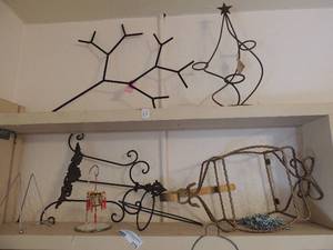 lot 275 image: Various pieces of metal wall art  and tea light holders