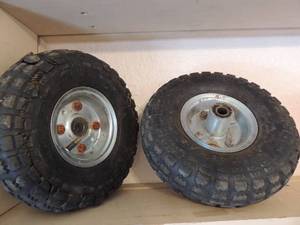 lot 276 image: 4.10-3.50 nylon riding mower tires need repair (used for dcor)