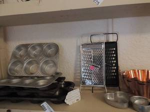 lot 283 image: 2 jello molds, muffin tins x 4 and cheese grater