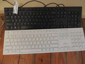 lot 295 image: Black DELL keyboard  and white DELL keyboard