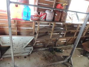 lot 318 image: Wooden clothing rack with metal pole on wheels 75x75