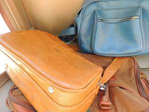 lot 330 image: Luggage lot suitcase with assorted brown carry ons