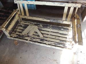 lot 359 image: Yellow wooden porch swing needs refurbish TLC
