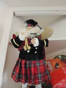 lot 391 image: 19 Santa statue, NIB lighted reindeer, 2 holiday table cloths