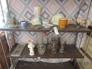 lot 395 image: Assorted misc.- napkin holder, 4 set of glasses gold fruit tree design, Christmas tree dcor bell, metal fish, ceramic yellow fish and more