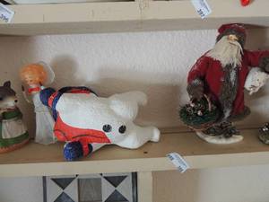 lot 398 image: Ceramic mouse with green dress 7 snowman 8x12 lighted. Angel 8.5 porcelain Santa with pine cones 11.5 golf Santa 12 height
