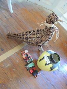 lot 455 image: wicker duck yellow ad black pottery vase