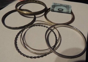 lot 523 image: 10 bangle bracelets-gold, silver, enamel