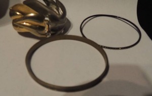 lot 524 image: 3 bracelets- 1 gold  silver cuff and 2 bangle