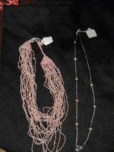 lot 546 image: Silver rhinestone ball necklace and pink seed bead necklace