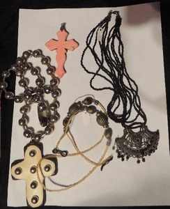 lot 548 image: Pink cross, silver cross ball necklace, womans eyeglass holder, and seed bead art deco necklace