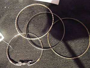 lot 555 image: Silver bracelets x 3- 1 is IOXYE