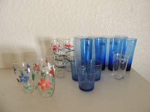 lot 32 image: 2 tall red white and blue cups, 5 small red white and blue cups, 8 cups with circle dcor, 2 blue and white tea cups, 1 J&C Meakin cup blue and white with house and flower, 2 white and green dcor corning tea cups and blue and green Shenango tea cup