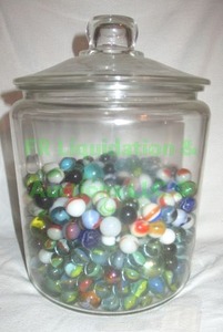 lot 30 image: 1 gallon lidded glass jar 34 full of glass marbles