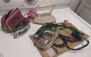 lot 298 image: Antique sad iron and mid-century travel irons