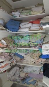 lot 243 image: Assorted textiles and linens as shown