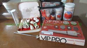 lot 58 image: Norelco beauty sache and other beauty supplies as shown