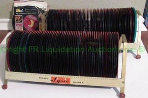 lot 333 image: Vintage 45 single records in vintage Lyric record holders