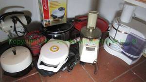 lot 90 image: Assorted counter top appliances including food processors, mixers and more