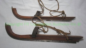 lot 185 image: Antique ice skates, wood, leather and metal blades