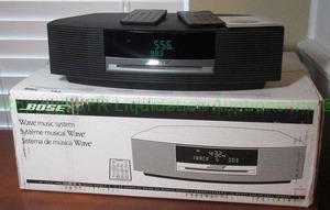 lot 183 image: Bose Wave music system plus remotes