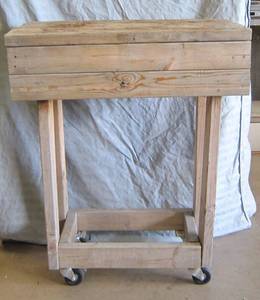 lot 476 image: Heavy wood rolling carttable