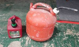 lot 562 image: 2 Plastic Gas Cans