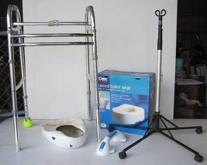 lot 593 image: Walker, raised toilet seat, bed pan, and more