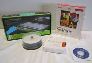 lot 601 image: Notebook quick dock, audio studio, CDs and keepers