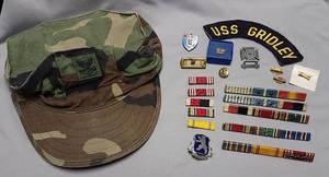 lot 693 image: military insignia, bars and more
