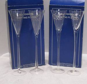 lot 713 image: 4 Millennium Toasting Flutes