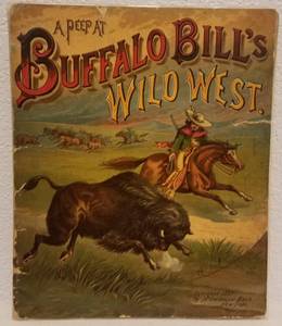 lot 9 image: ANTIQUE 1887 A PEEP AT BUFFALO BILLS WILD WEST ILLUSTRATED BOOK (133 YEARS OLD)