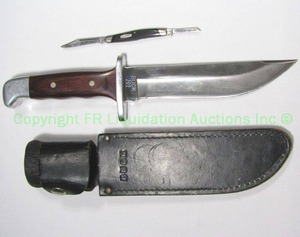 lot 256 image: Buck 124 Frontiersman knife with original sheath 6.25 blade, includes Buck mini pocket knife