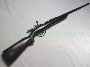 lot 383 image: .22 caliber single bolt action rifle, barrel has some exterior pitting