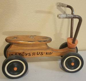 lot 1 image: VINTAGE TOYS R US CHILDS WOODEN RIDE-ON TOY  (18 L x 15.5 W x 14 H)