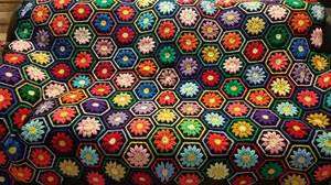 lot 166 image: LARGE SIZE HAND MADE CROCHETED BLANKET WITH FLOWERS DESIGN (79 x 65)