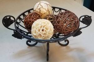 lot 168 image: IRON ROUND VASE WITH ASSORTED DECORATIVE SPHERES (16.75 W x 7 H)