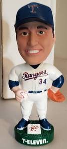 lot 333 image: NOLAN RYAN BOBBLE HEAD FIGURE