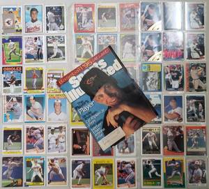 lot 358 image: LARGE LOT OF ASSORTED CAL RIPKEN CARDS IN PROTECTIVE SHEETS
