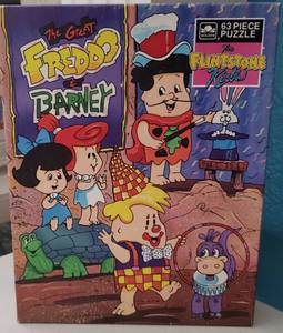 lot 376 image: 1987 FLINTSTONES KIDS 63 PIECE PUZZLE IN UNOPENED BOX