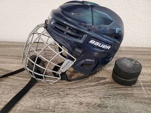 lot 28 image: Bauer Certified Hockey Helmet & 2 Hockey Pucks