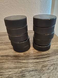 lot 29 image: 10 Official Canada Black Hockey Pucks