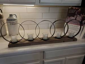 lot 68 image: 5 Circle Metal Candle Holder with Wood Base