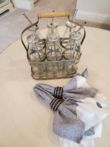 lot 197 image: 6 Glass Milk Bottles with Metal Straws in Carrier & Napkins