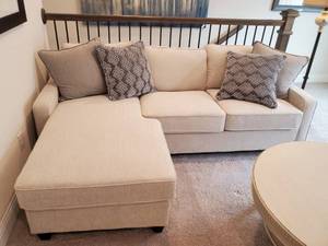 lot 199 image: Khaki & Cream Upholstered Sofa with Chaise  Throw Pillows