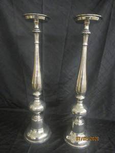 lot 22 image: DUO SILVER 30 HEIGHT PILLAR CANDLE HOLDERS FLOOR STANDING OR TABLE TOP&nbsp