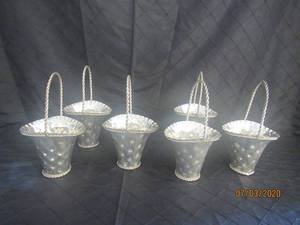 lot 166 image: TOTAL OF 6 VINTAGE S.N.K.ENT SILVER FLOWER BASKET DIMPLED VASE INDIA 10 12 HEIGHT TWISTED HANDLE&nbsp