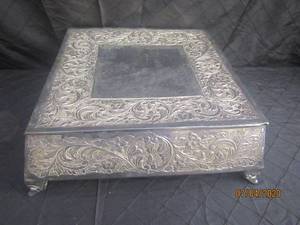 lot 221 image: SILVER SQUARE FOOTED&nbsp EMBOSSED FLORAL DESIGN METAL CAKE STAND&nbsp&nbsp16 X 16 X 6 H&nbsp