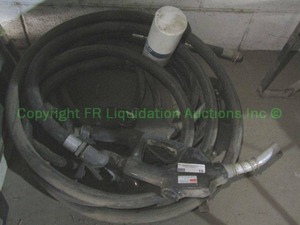 lot 19 image: Dayton fuel pump nozzles model 10J823 and hoses, 2 total