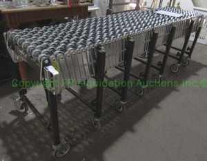 lot 32 image: Industrial accordian type extension rollers